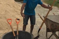 Dau cleaning up the tools at the end of the day