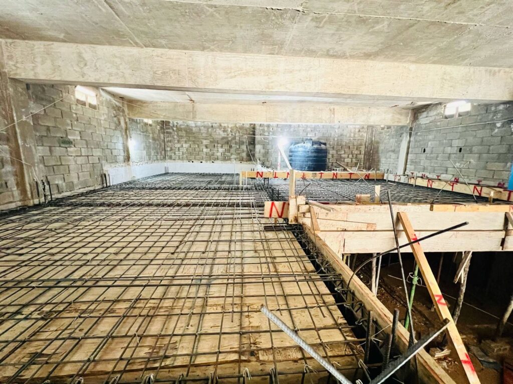 Framing with rebar in preparation for new concrete slab.