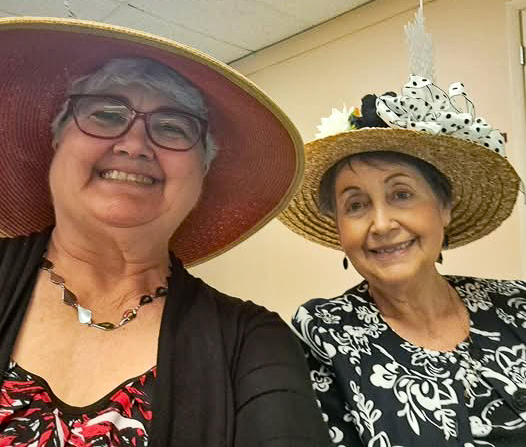 Jacki Stranathan and her mom wearing hats and smiling.
