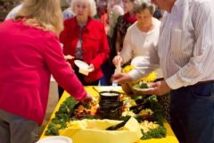 Guests enjoy appetizers before the meal.